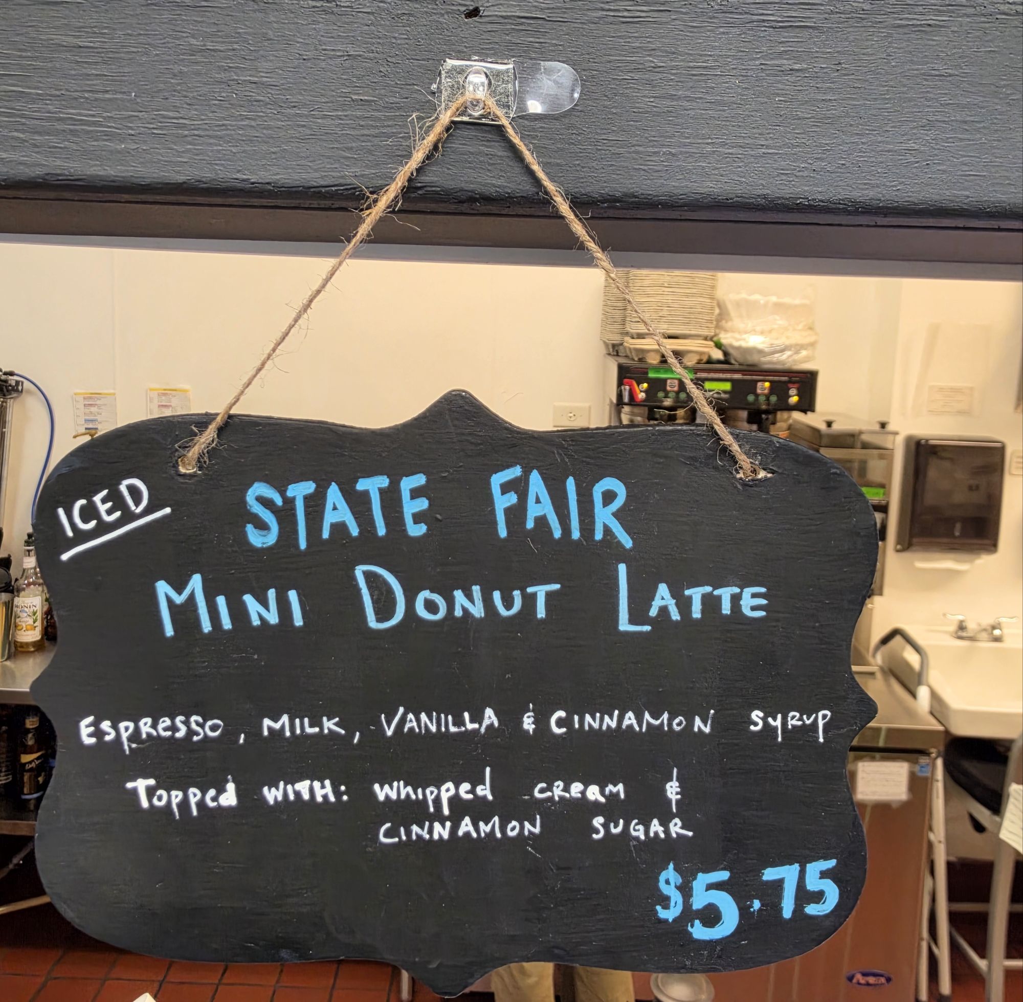 Sign about MN State Fair mini-donut latte.